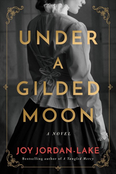 Under a gilded moon : a novel / Joy Jordan-Lake.